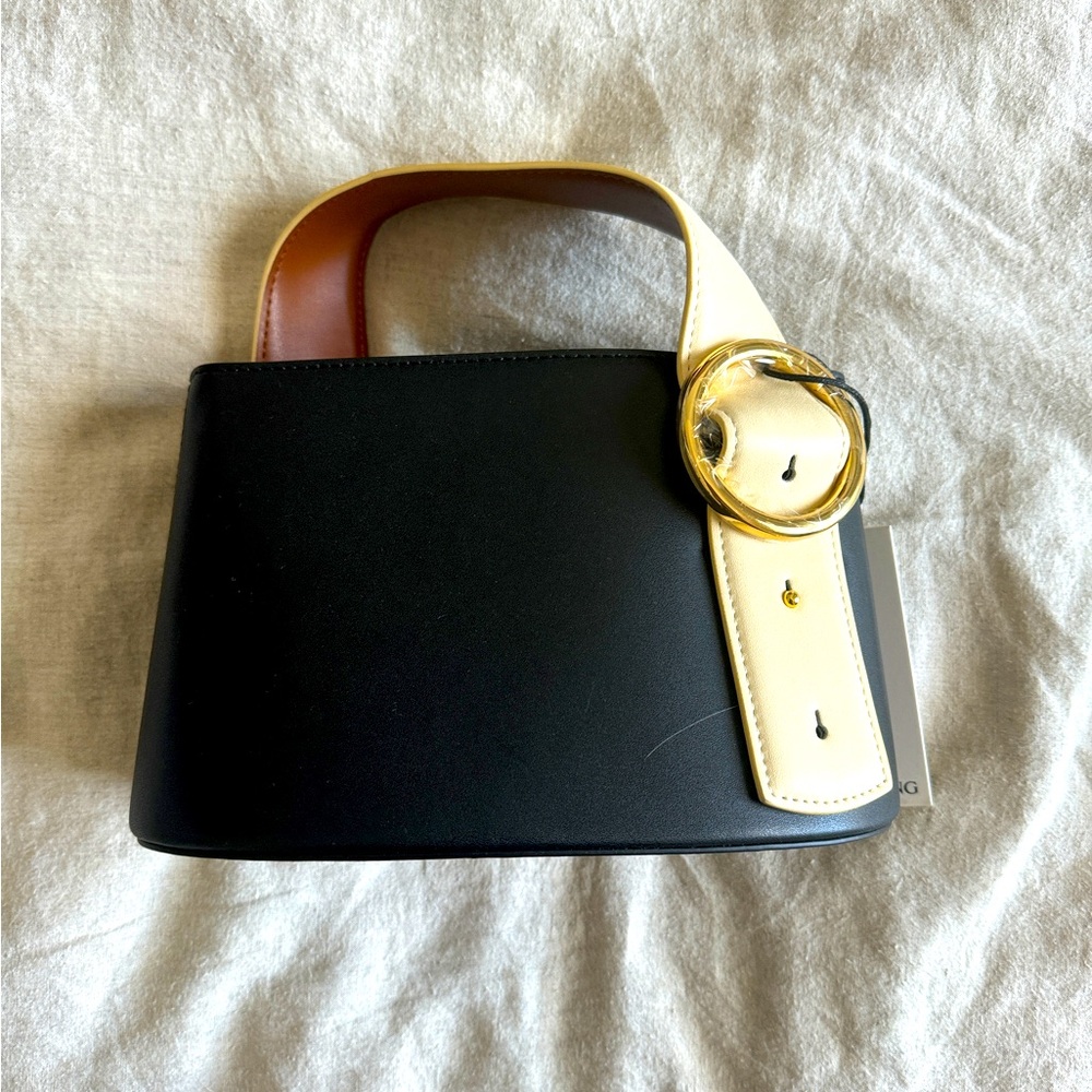 Parisa wang black and white calfskin cutch with gold buckle